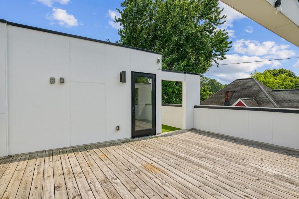 536 Highland Avenue Northeast, Unit A Atlanta, GA 30312 - Photo 37 of 51 a view of a backyard of a house with wooden floor