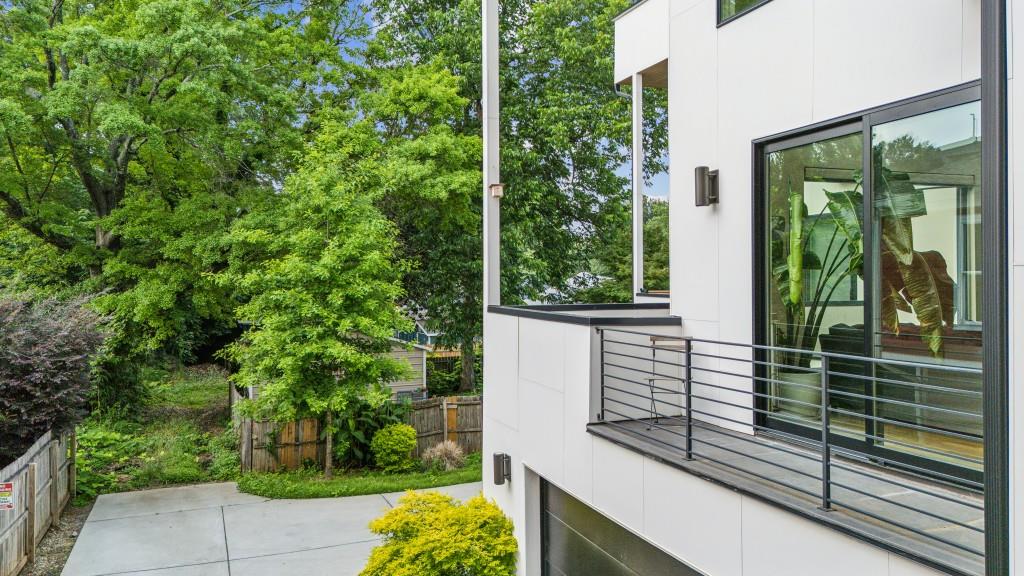 536 Highland Avenue Northeast, Unit A Atlanta, GA 30312 - Photo 40 of 51 a view of a balcony with a tree