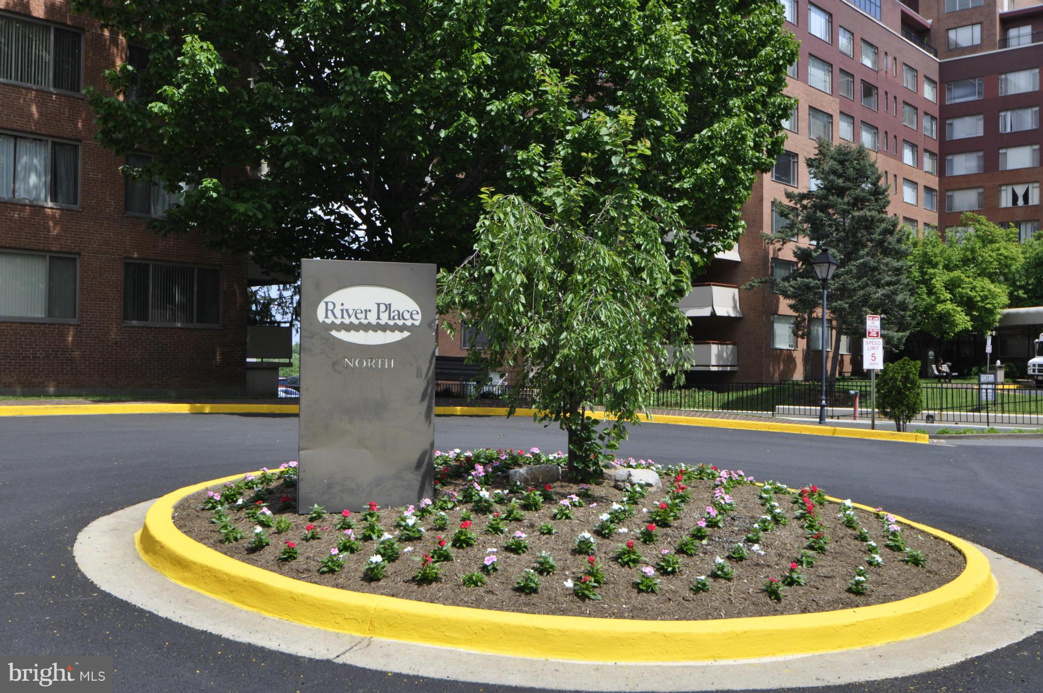 1121 Arlington Boulevard, Unit 842 Arlington, VA 22209 - Photo 25 of 30 a view of a swimming pool with a yard