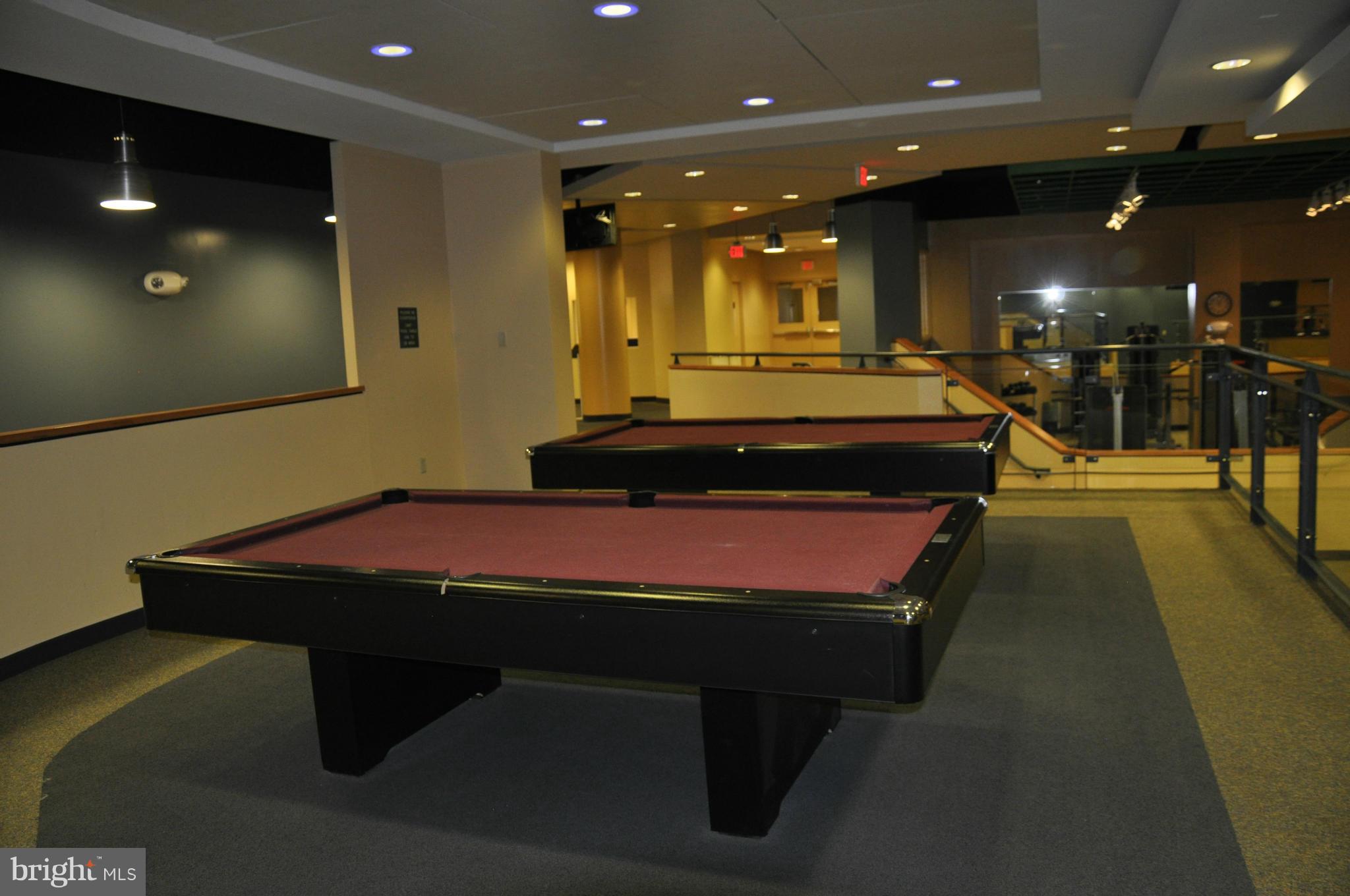 1121 Arlington Boulevard, Unit 842 Arlington, VA 22209 - Photo 29 of 30 a room with pool table and couches in a room