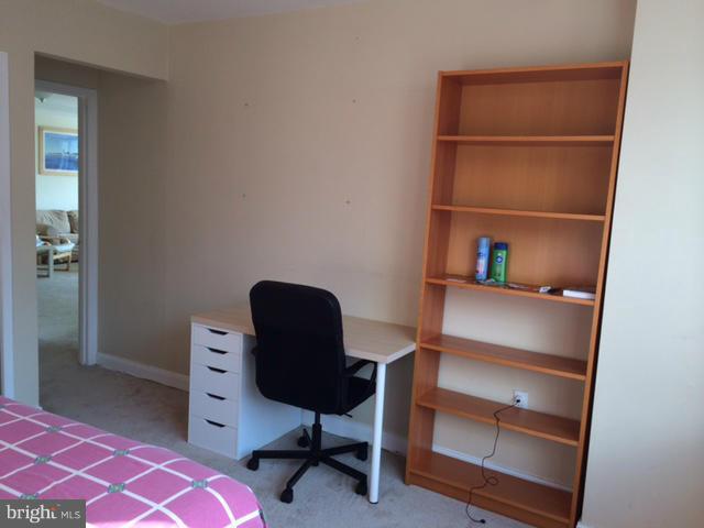 1121 Arlington Boulevard, Unit 842 Arlington, VA 22209 - Photo 9 of 30 a workspace with furniture and a window