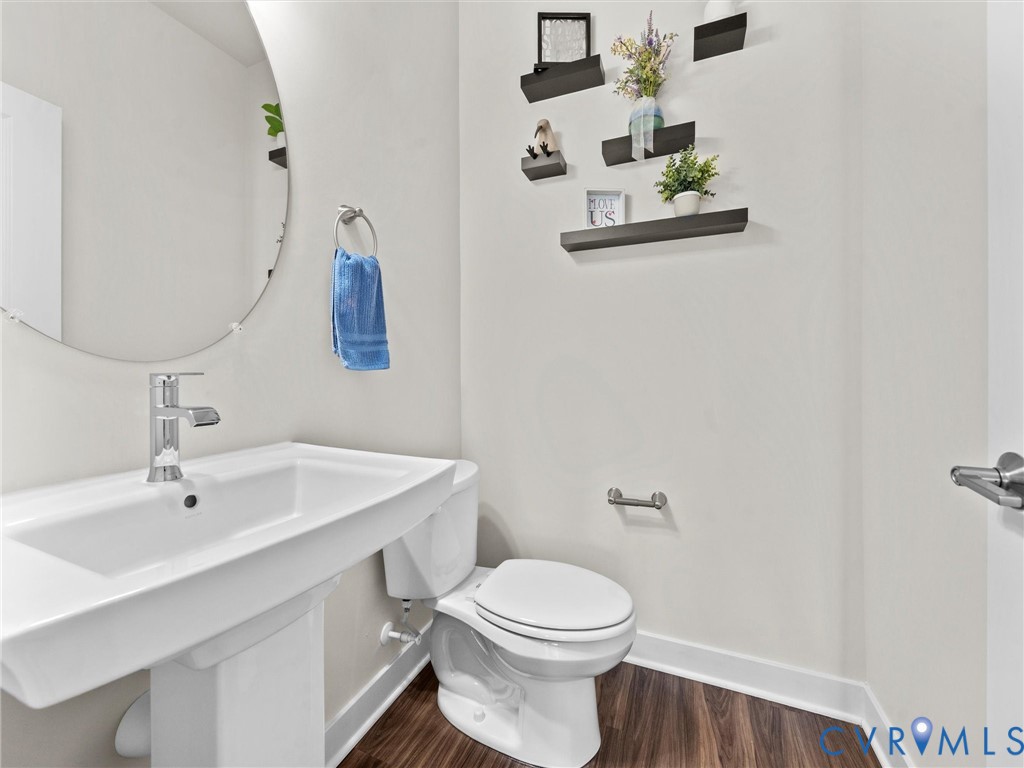 12320 Petrel Crossing Midlothian, VA 23112 - Photo 15 of 34 a bathroom with a sink mirror and toilet