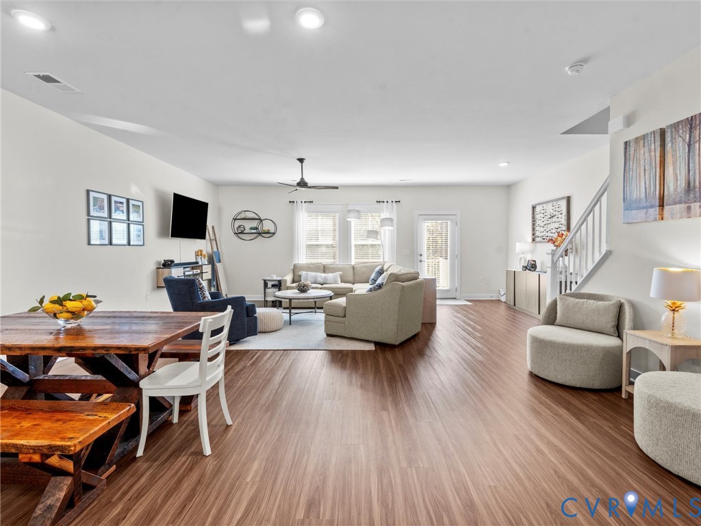 12320 Petrel Crossing Midlothian, VA 23112 - Photo 9 of 34 a living room with furniture and a wooden floor