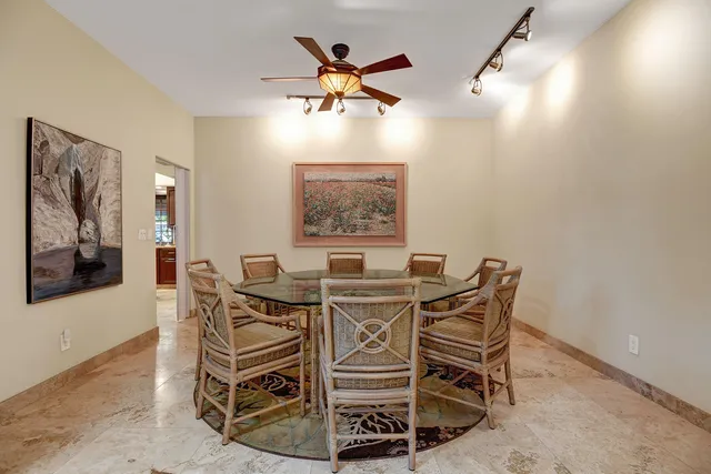 a view of a dining room with furniture