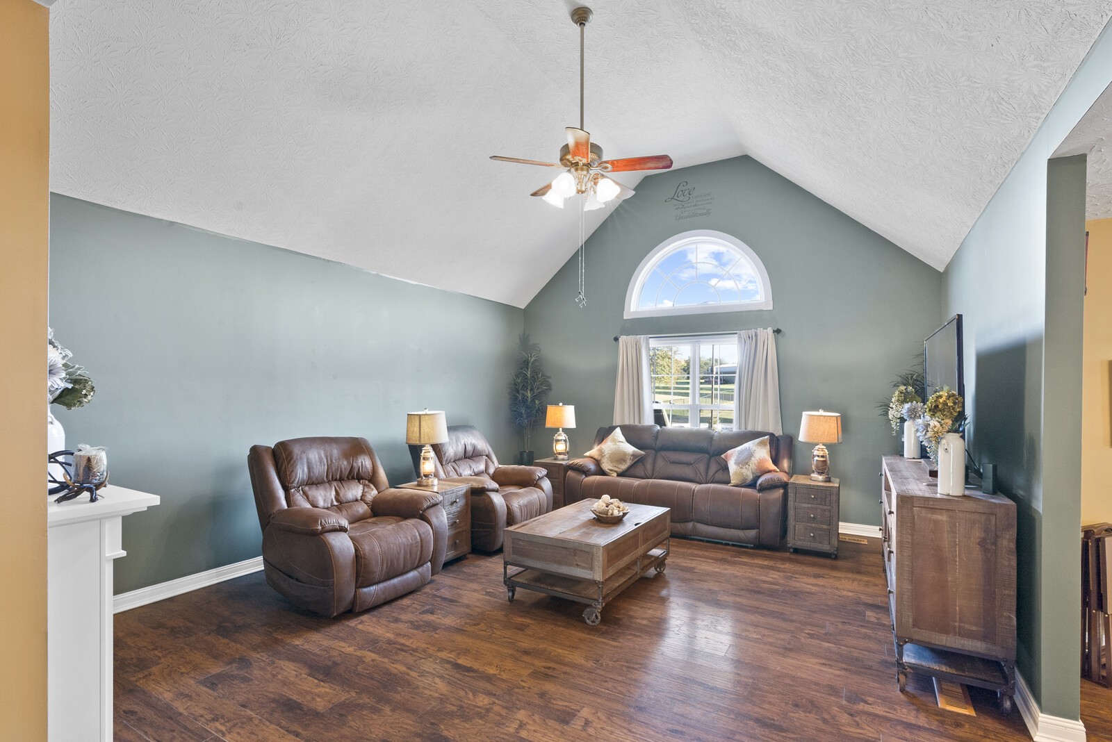 101 Brandy Hollow Road Portland, TN 37148 - Photo 3 of 50 a living room with furniture chandelier and a window