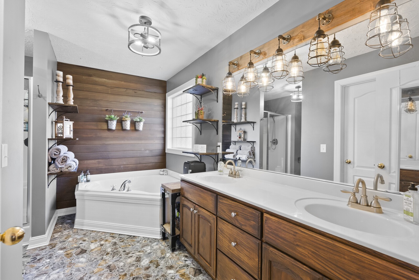 101 Brandy Hollow Road Portland, TN 37148 - Photo 23 of 50 a bathroom with a double vanity sink mirror and bathtub