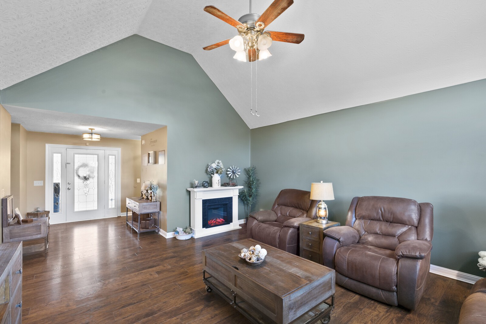 101 Brandy Hollow Road Portland, TN 37148 - Photo 4 of 50 a living room with furniture and a fireplace