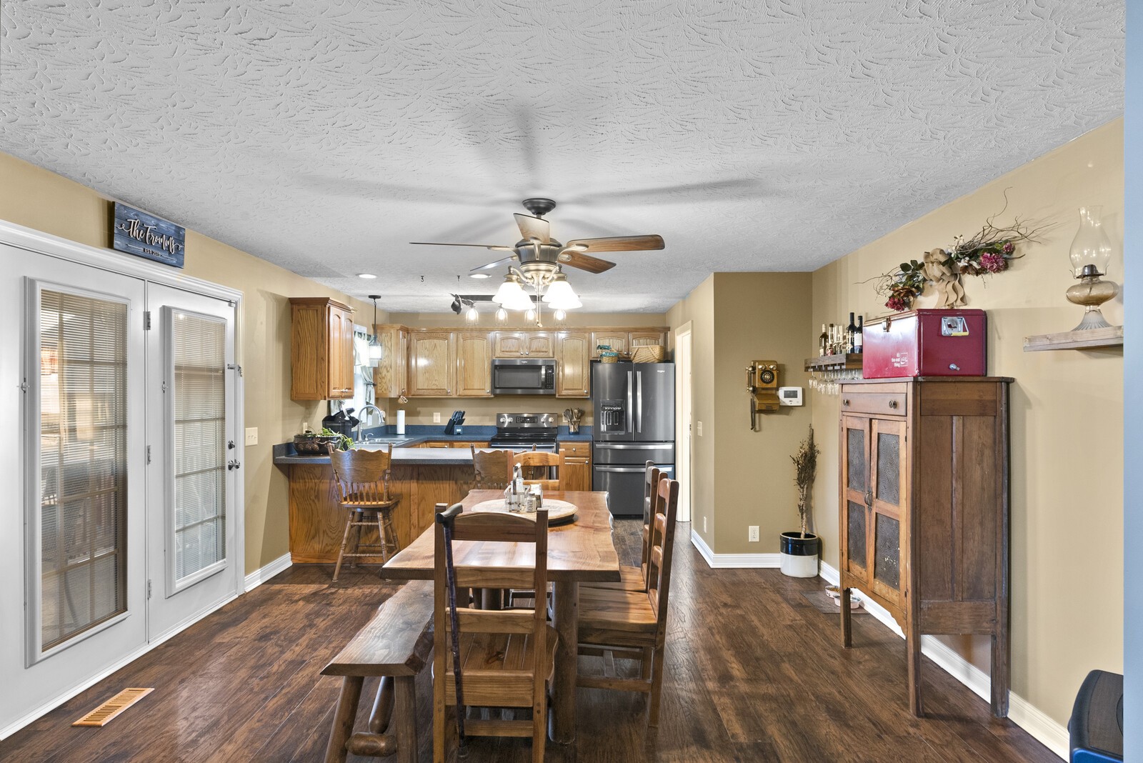 101 Brandy Hollow Road Portland, TN 37148 - Photo 7 of 50 a view of a dining room with furniture a chandelier and wooden floor
