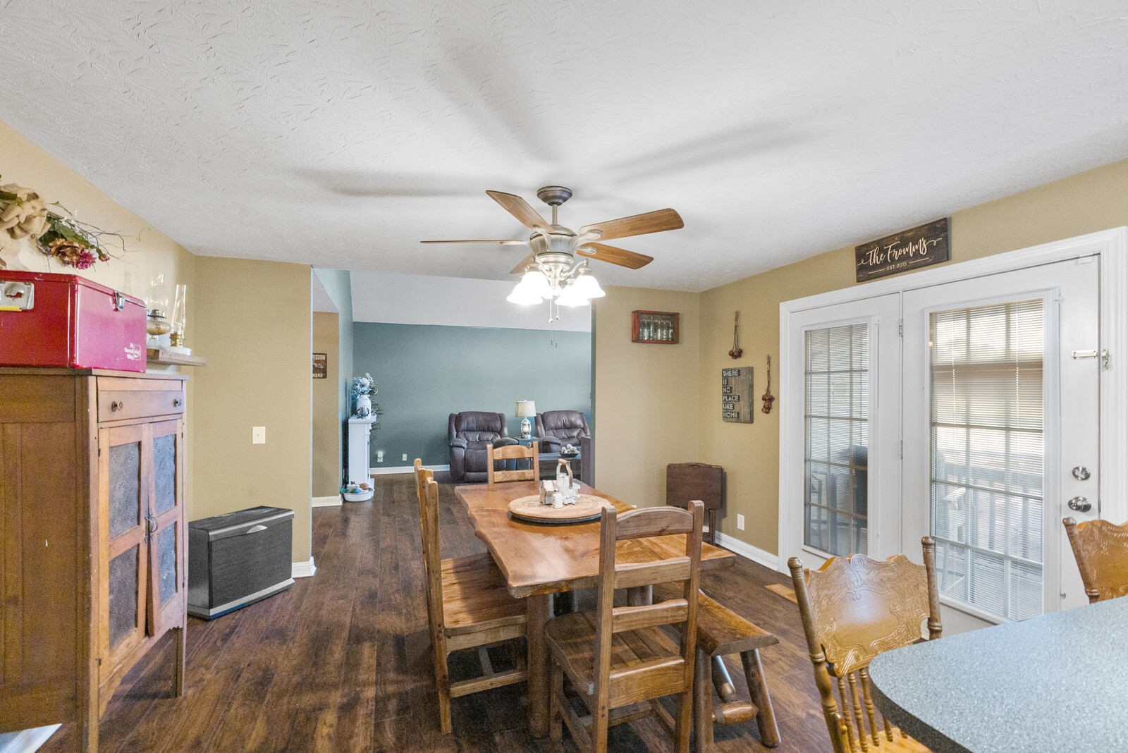 101 Brandy Hollow Road Portland, TN 37148 - Photo 9 of 50 a dining room with furniture a chandelier and wooden floor