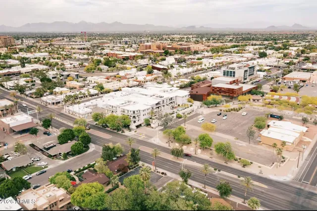 an aerial view of a city with lots of residential buildings