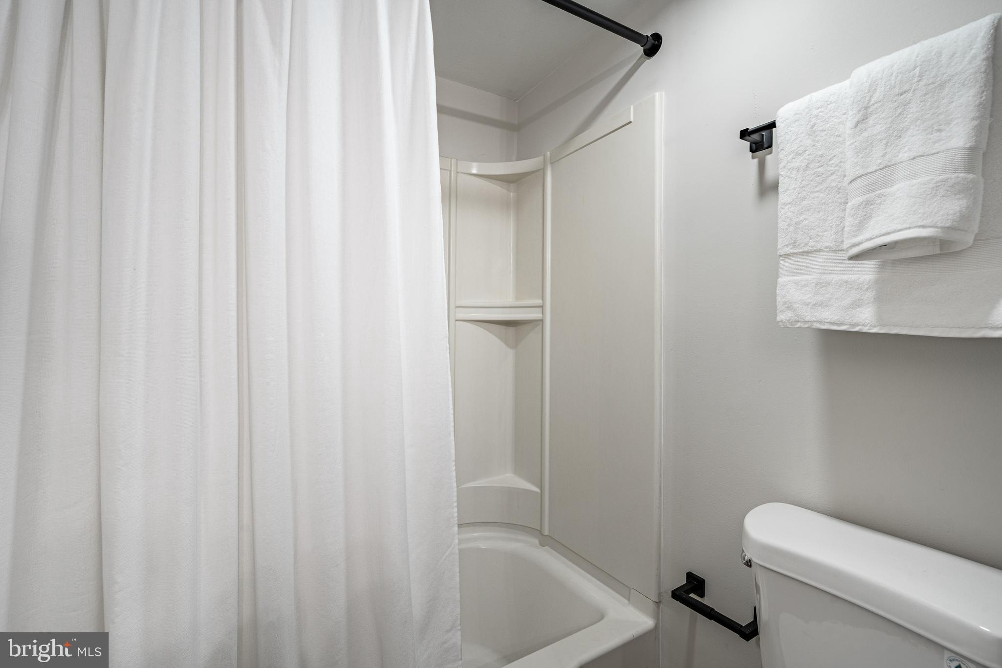 2714 Eagle Road, Unit 2714 West Chester, PA 19382 - Photo 18 of 25 a bathroom with a toilet and shower