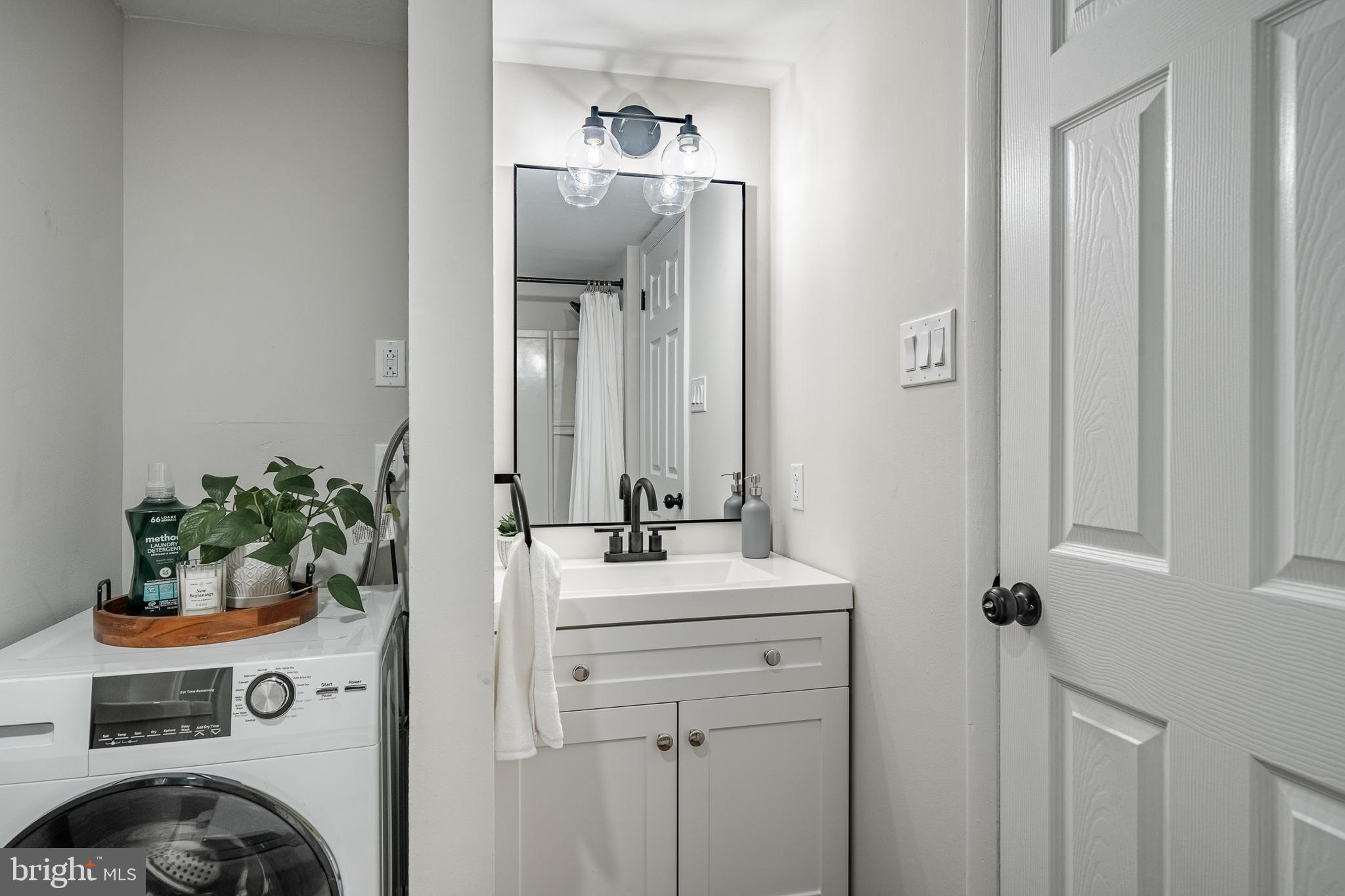 2714 Eagle Road, Unit 2714 West Chester, PA 19382 - Photo 19 of 25 a bathroom with a sink and a mirror