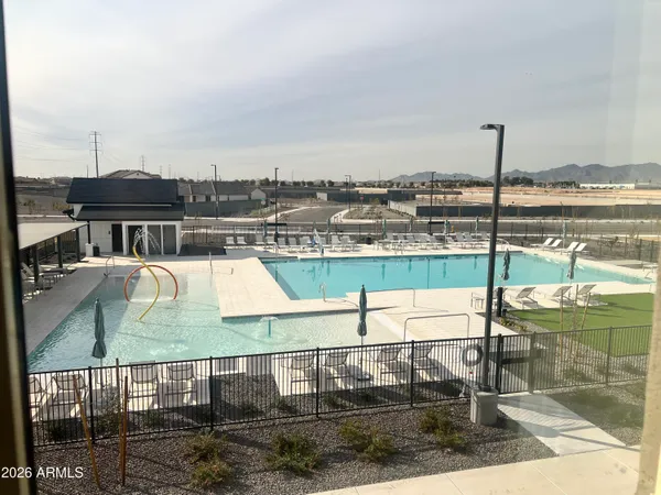 a view of entryway with stairs and wooden floor
