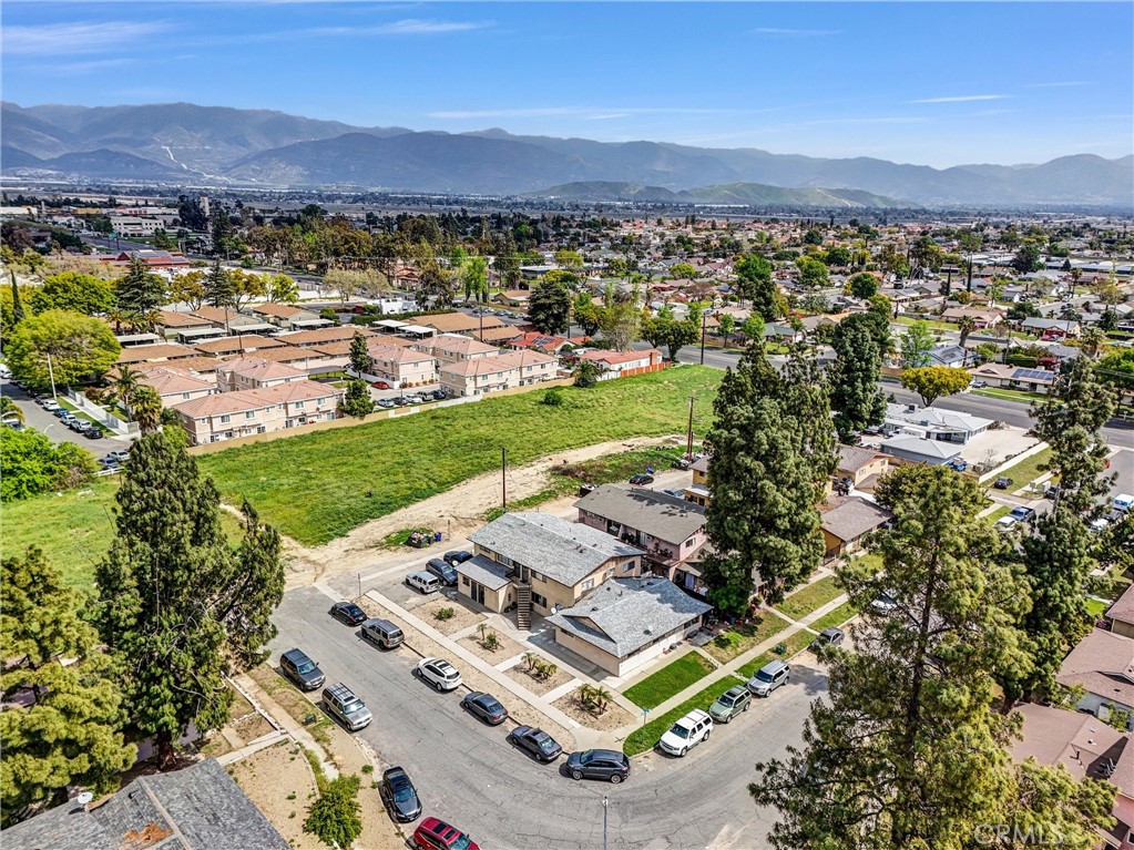 160 West Cascade Drive Rialto, CA 92376 - Photo 4 of 28 an aerial view of a residential houses and city view