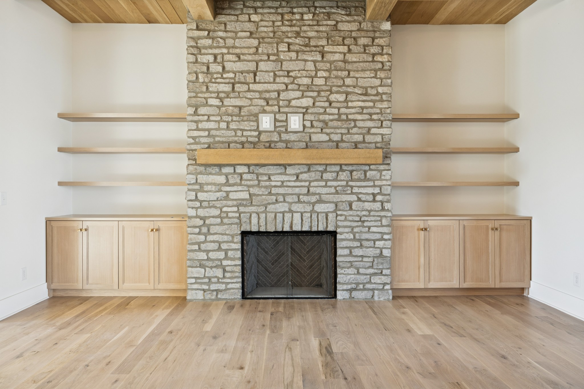 2016 Albatross Way Gallatin, TN 37066 - Photo 28 of 88 a view of empty room with wooden floor and a fireplace