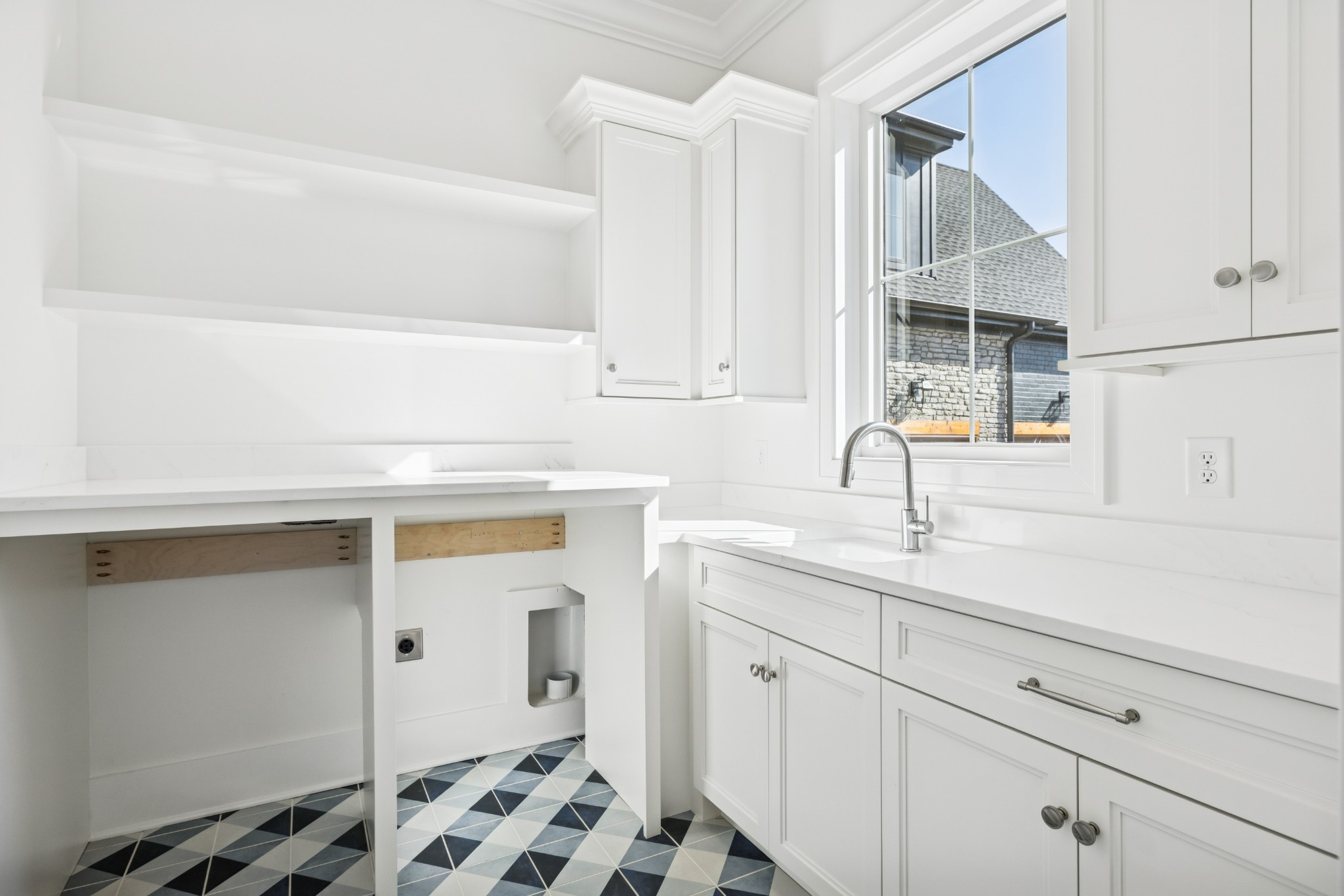 2016 Albatross Way Gallatin, TN 37066 - Photo 56 of 88 a kitchen with a sink and cabinets
