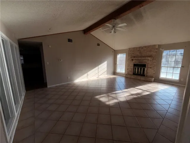a view of a livingroom with a fireplace