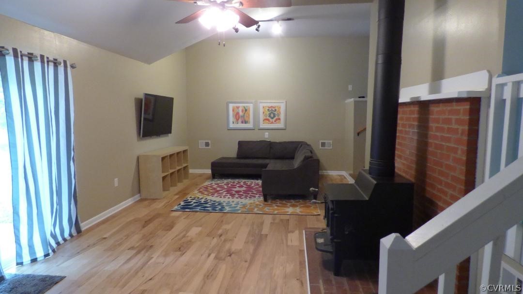 10421 Cattail Road Chesterfield, VA 23838 - Photo 3 of 12 Open family room with wood stove