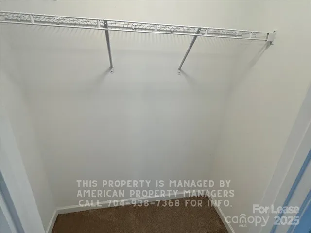 a view of small space with racks on the wall