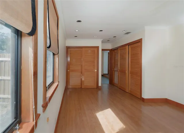 a view of entryway with wooden floor