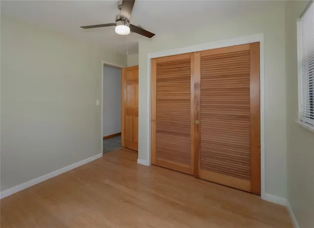 an empty room with closet