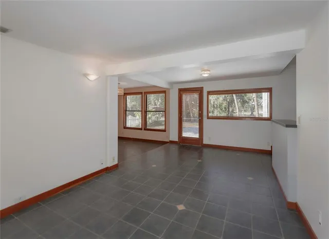 an empty room with windows