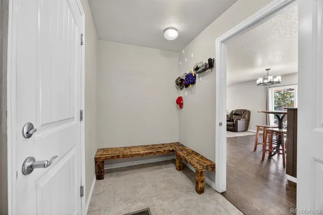 a bed room with a bed and a window