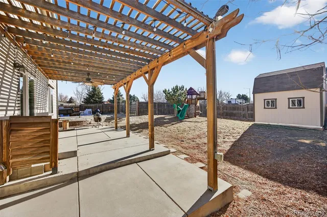 a open living room with a white wall