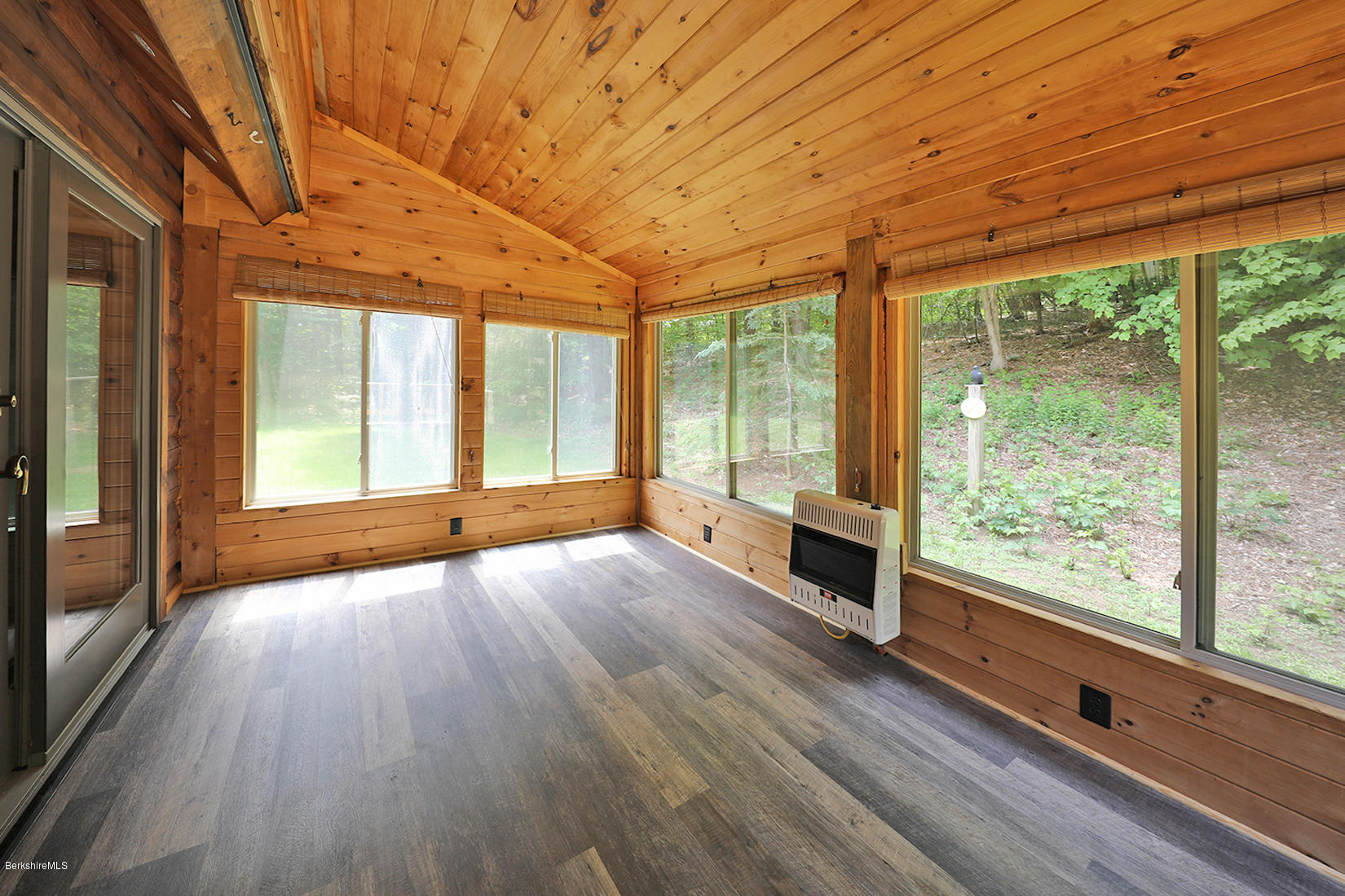 71 North Washington State Road Washington, MA 01223 - Photo 11 of 18 a view of empty room with wooden floor and fan