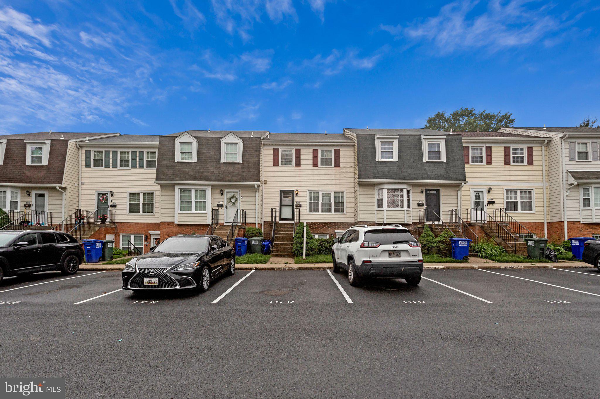 1675 Ridgely Court, Unit 182 Crofton, MD 21114 - Photo 14 of 47 a car parked in front of a big building
