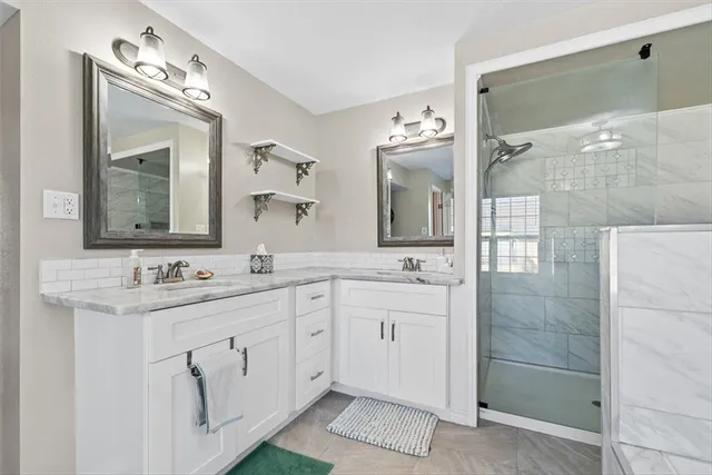 a utility room with closet dryer and washer