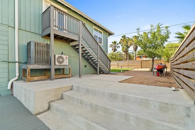 a room with furniture and pool table