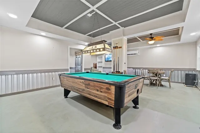 a view of a chairs and table in the balcony