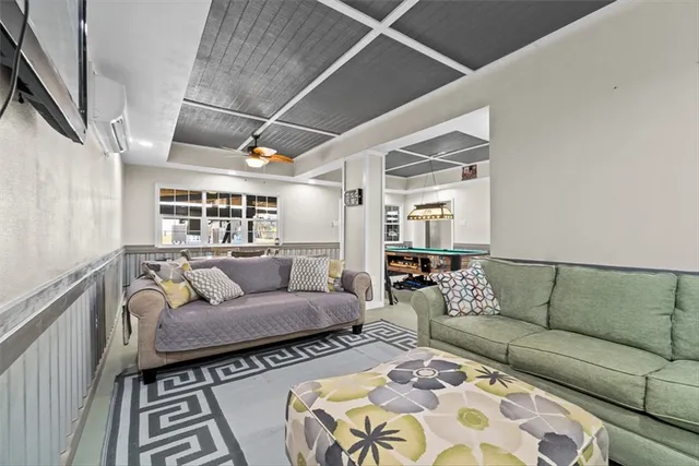 a bed room with a bed and a chandelier