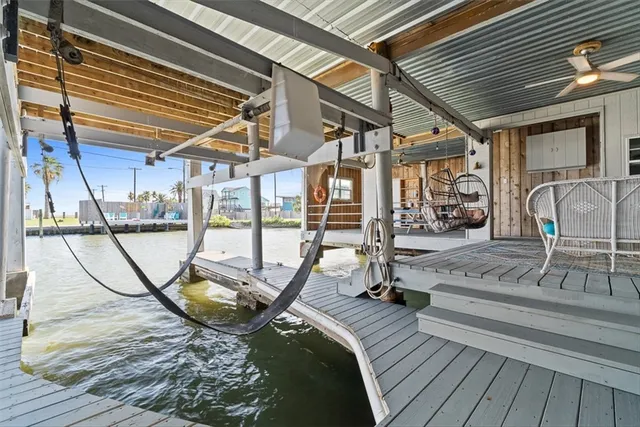 a outdoor space with wooden floor and windows