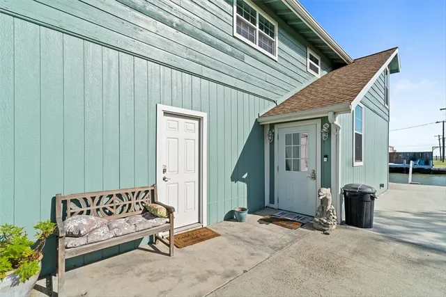 a view of a house with a bed and a couch