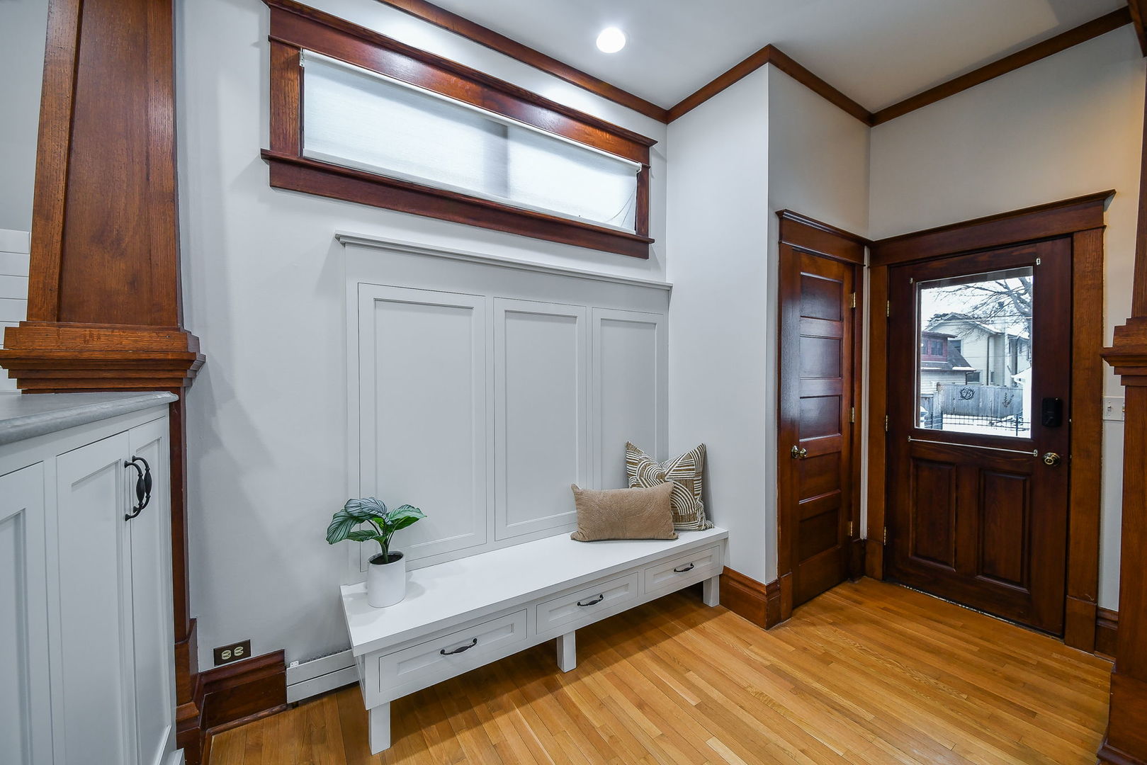 223 North Ellsworth Street Naperville, IL 60540 - Photo 13 of 48 a living room with furniture and a window