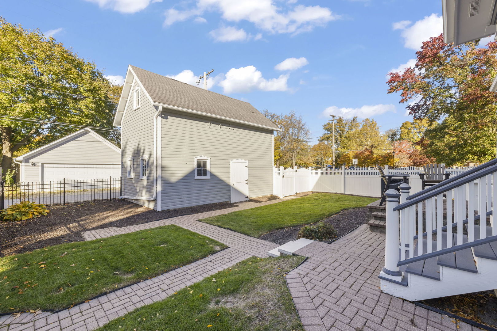 223 North Ellsworth Street Naperville, IL 60540 - Photo 14 of 48 a view of a backyard with a garden
