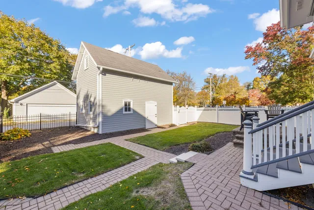 a view of a backyard with a garden