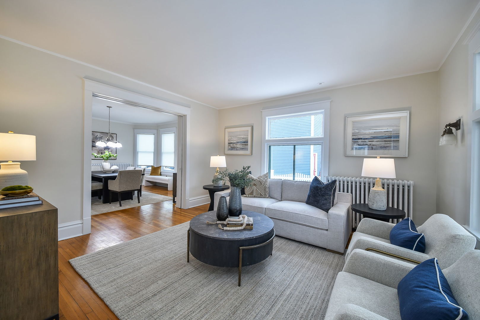 223 North Ellsworth Street Naperville, IL 60540 - Photo 2 of 48 a living room with furniture and a wooden floor