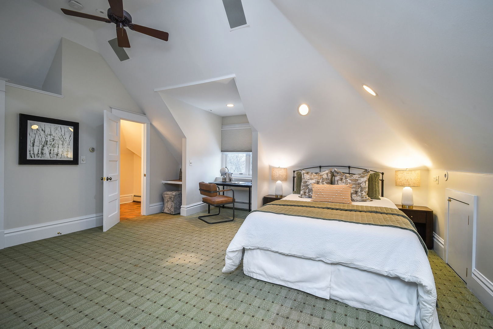 223 North Ellsworth Street Naperville, IL 60540 - Photo 28 of 48 a spacious bedroom with a bed a couch and a dresser