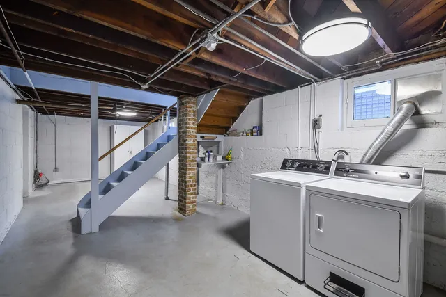 a view of an empty room with stairs