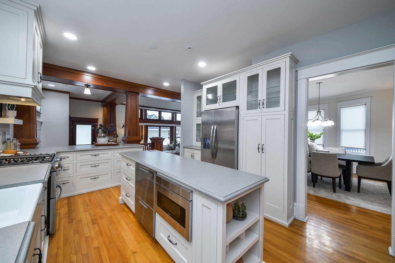223 North Ellsworth Street Naperville, IL 60540 - Photo 6 of 48 a kitchen with stainless steel appliances granite countertop a refrigerator a stove and a wooden floors
