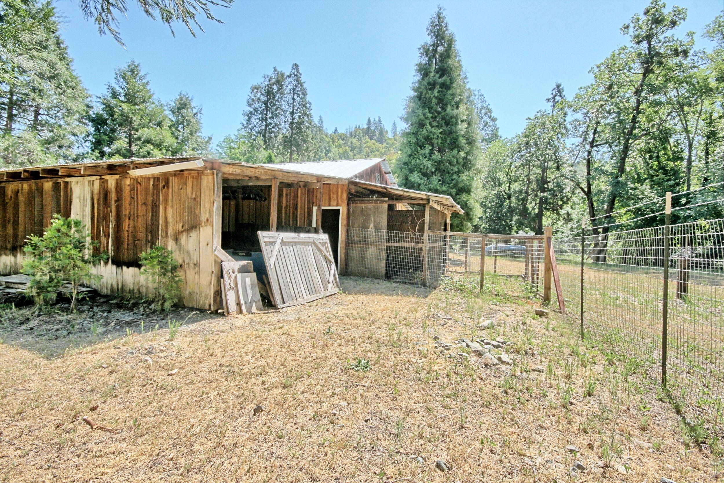 199 Powell Creek Road Williams, OR 97544 - Photo 52 of 57 a view of a house with backyard