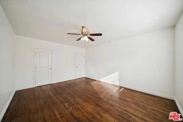 a view of a big room with wooden floor