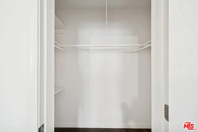 a view of small space with racks on the wall