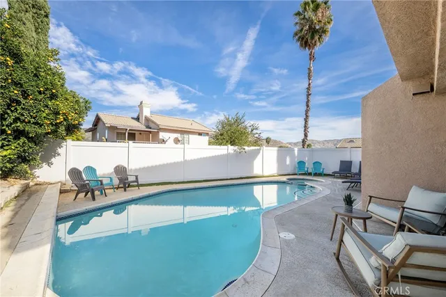 a view of a yard with palm tree