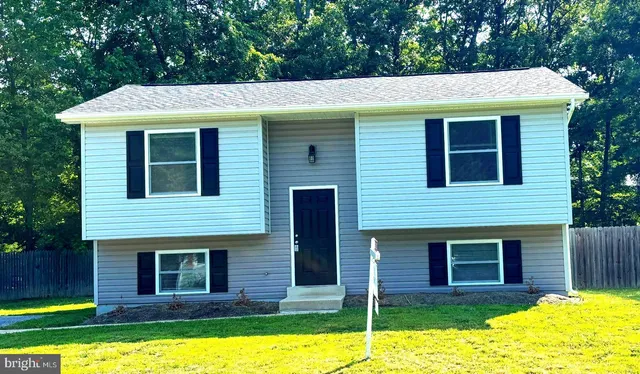 a view of a house with a swimming pool