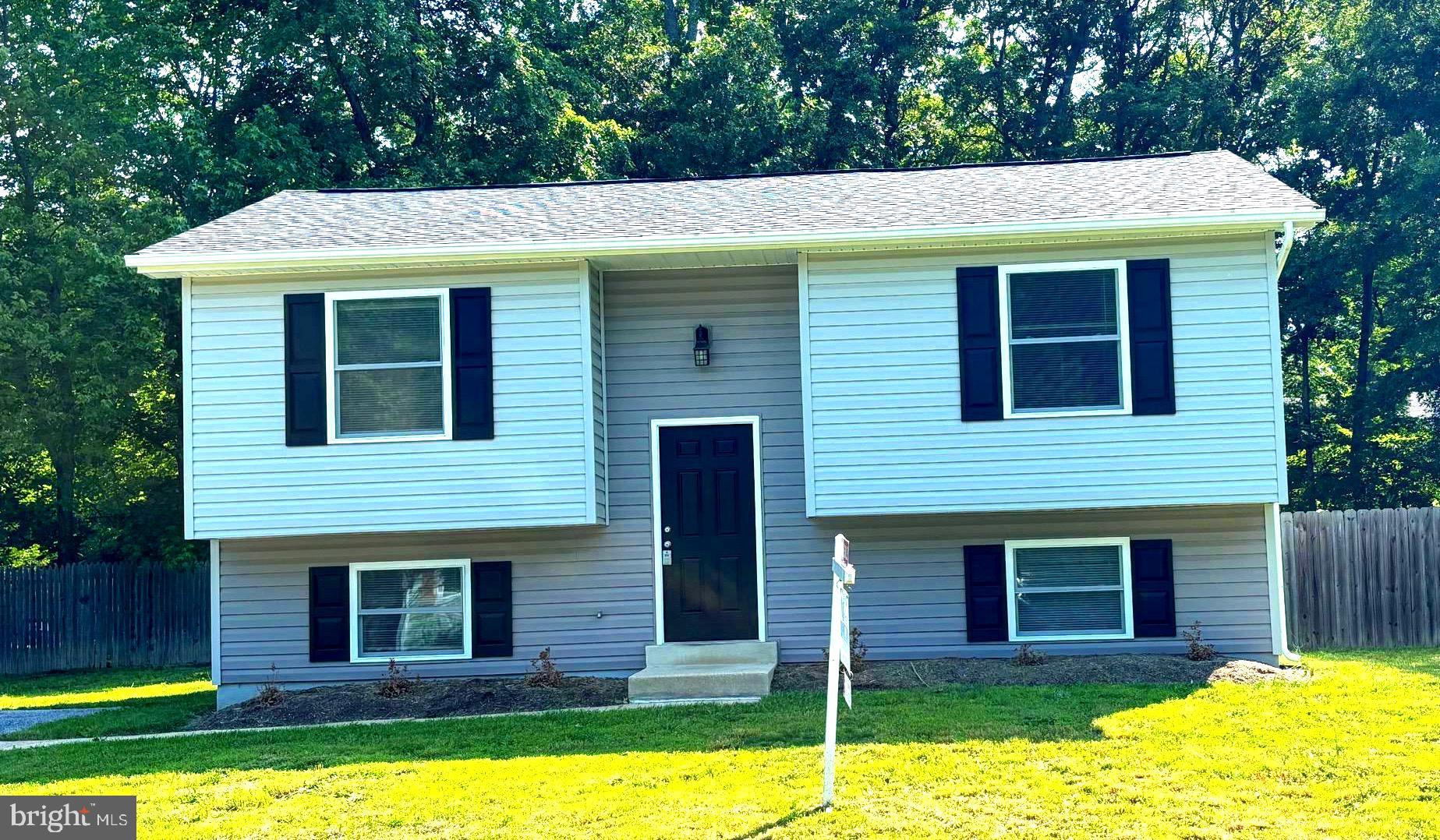 12820 Twin Oak Drive Waldorf, MD 20601 - Photo 1 of 98 a view of a house with a swimming pool