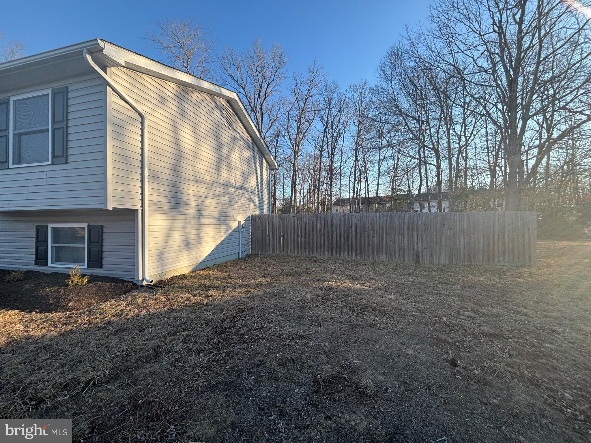 12820 Twin Oak Drive Waldorf, MD 20601 - Photo 4 of 98 a view of backyard with wooden fence